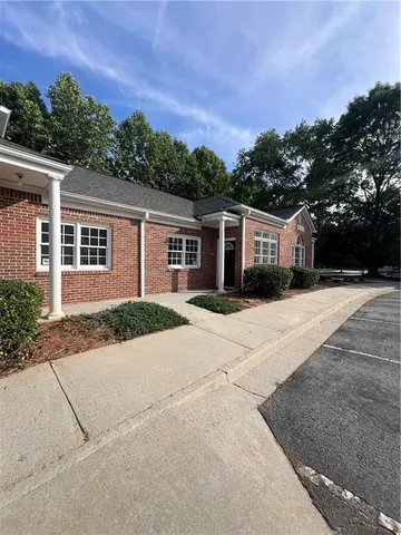 front view of a house with a street