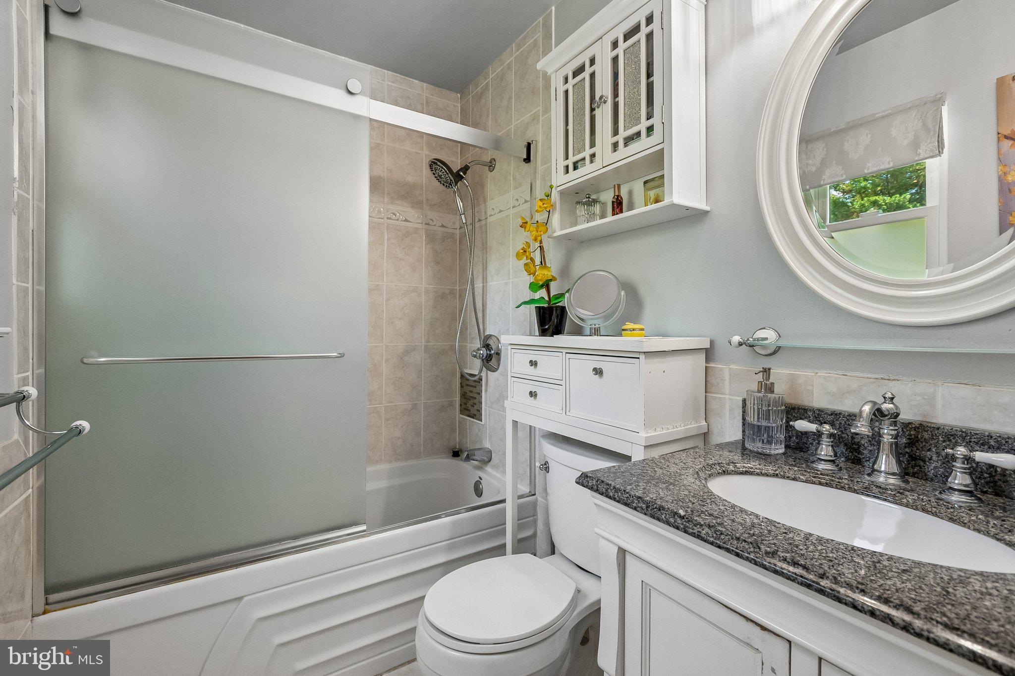 7610 Bentree Road Fort Washington, MD 20744 - Photo 14 of 25 Elegant bathroom with modern finishes.