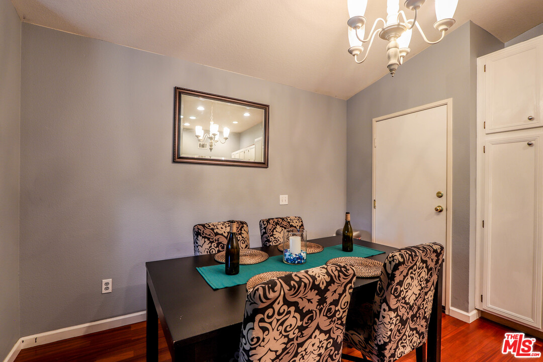 363 Chaumont Circle Foothill Ranch, CA 92610 - Photo 12 of 20 a view of a dining room with furniture and wooden floor