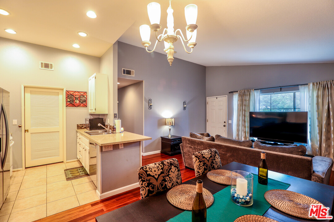 363 Chaumont Circle Foothill Ranch, CA 92610 - Photo 14 of 20 a living room with furniture and a flat screen tv