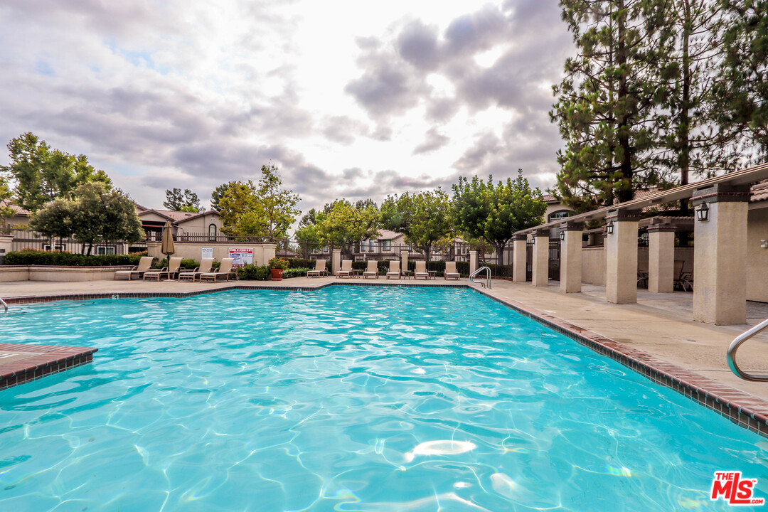 363 Chaumont Circle Foothill Ranch, CA 92610 - Photo 16 of 20 a view of yard with swimming pool and green space