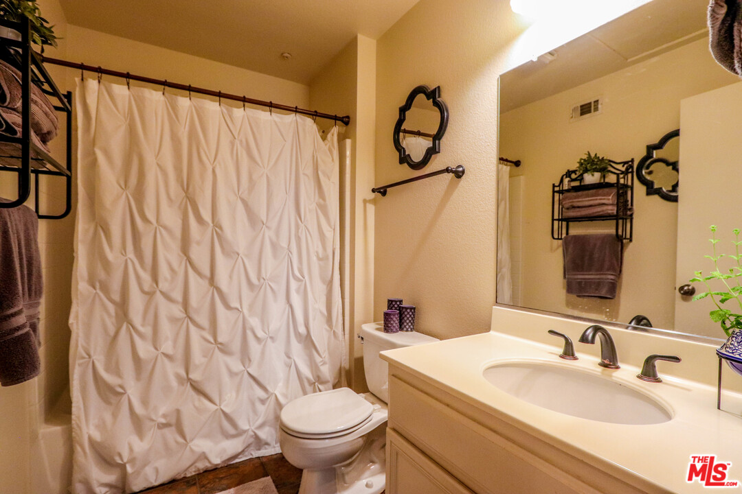 363 Chaumont Circle Foothill Ranch, CA 92610 - Photo 8 of 20 a bathroom with a sink and a toilet