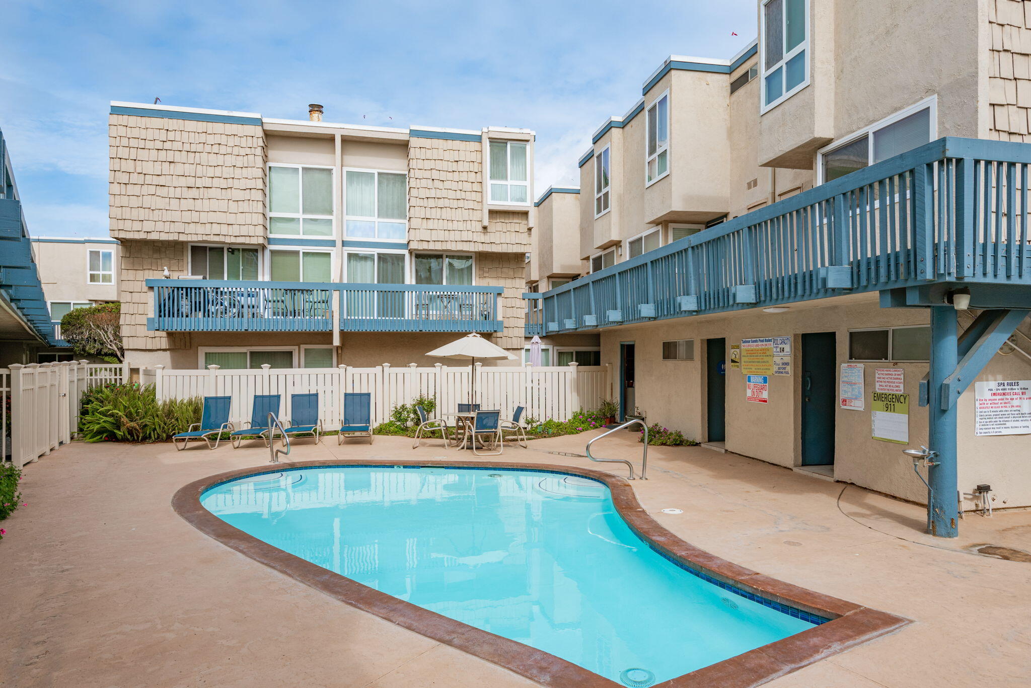4700 Sandyland Road, Unit 35 Carpinteria, CA 93013 - Photo 22 of 38 a view of a large building with a swimming pool