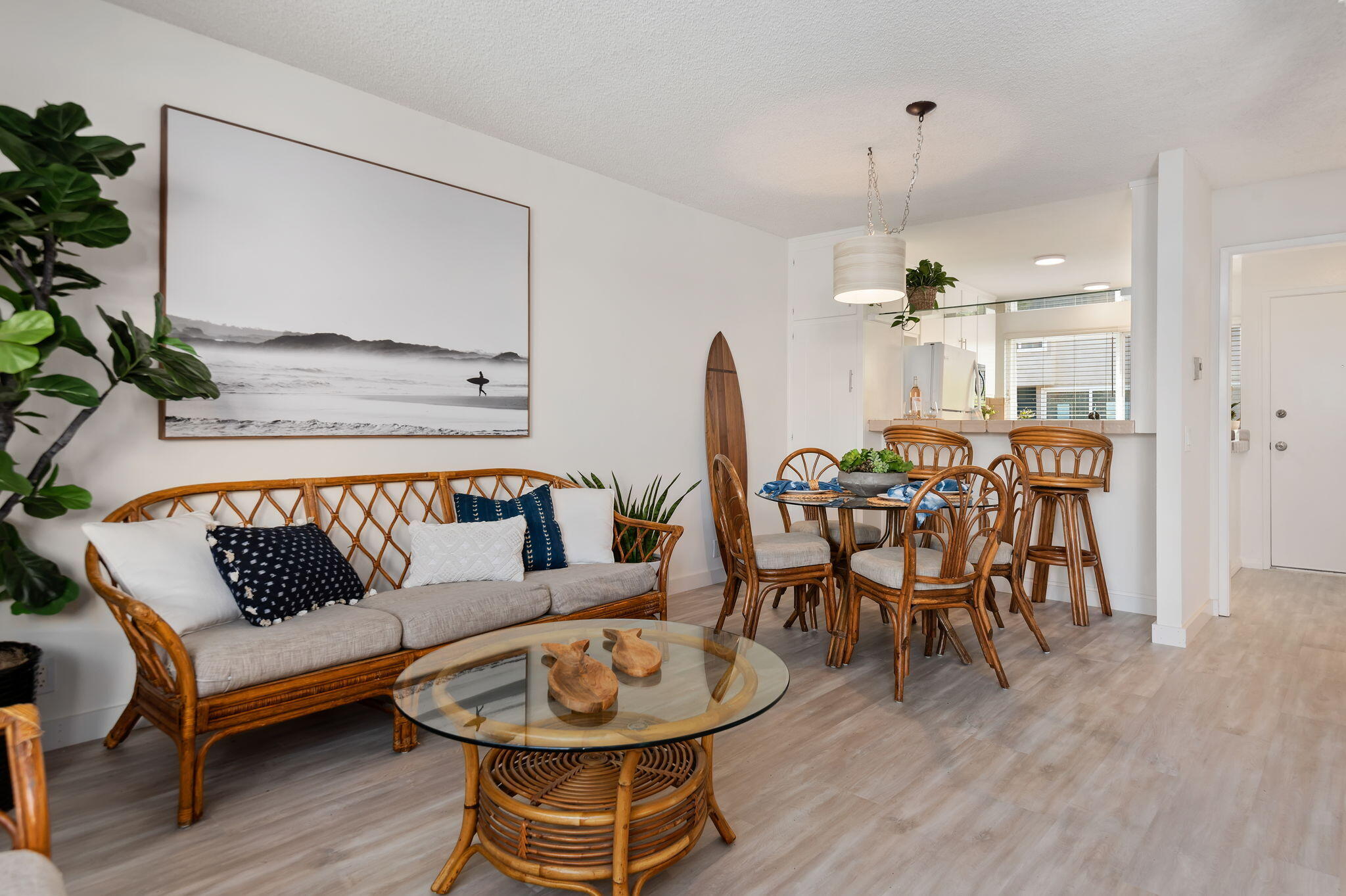 4700 Sandyland Road, Unit 35 Carpinteria, CA 93013 - Photo 3 of 38 a living room with furniture a dining table and a potted plant