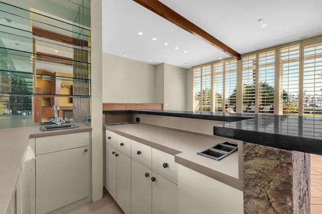 a bathroom with a shower and a bath tub