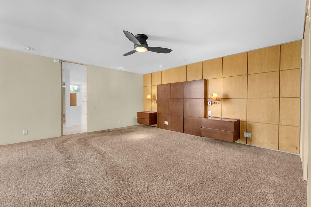 1421 Tamarisk W Street, Unit 3 Rancho Mirage, CA 92270 - Photo 19 of 65 a view of an empty room with a window