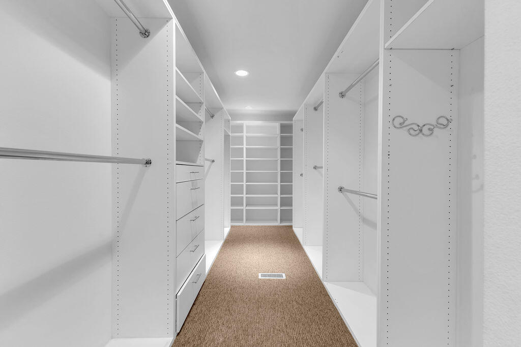 1421 Tamarisk W Street, Unit 3 Rancho Mirage, CA 92270 - Photo 25 of 65 a view of hallway with stairs and wooden floor