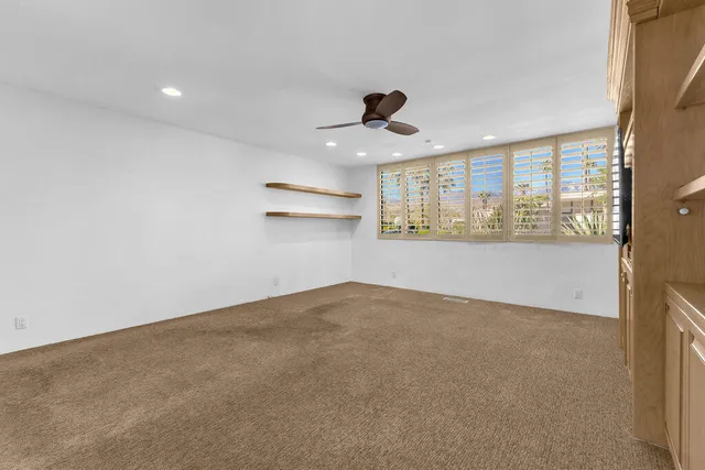 a view of a city with mountains in the background