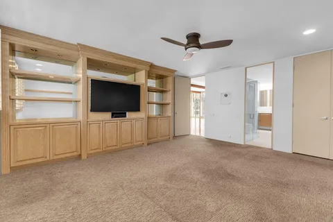 a view of a city with mountains in the background