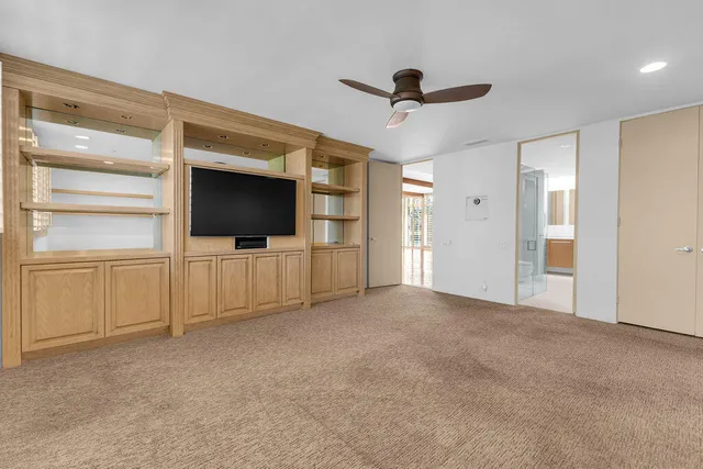 a view of a city with mountains in the background