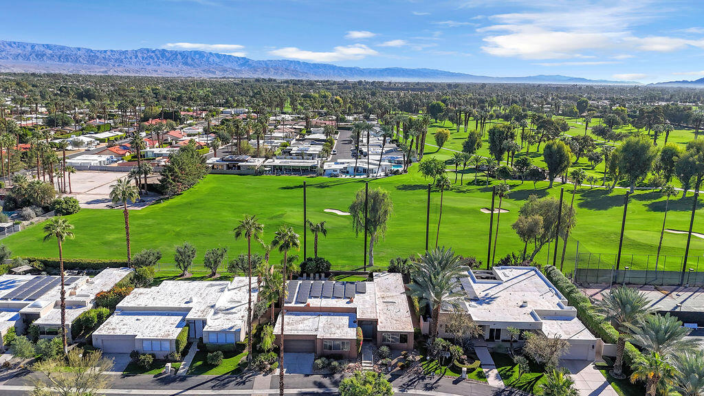 1421 Tamarisk W Street, Unit 3 Rancho Mirage, CA 92270 - Photo 54 of 65 a view of a city with lots of residential buildings ocean and mountain view in back