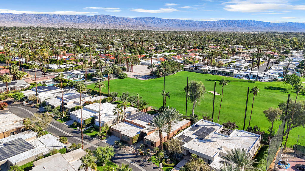 1421 Tamarisk W Street, Unit 3 Rancho Mirage, CA 92270 - Photo 55 of 65 a view of a city with a mountain