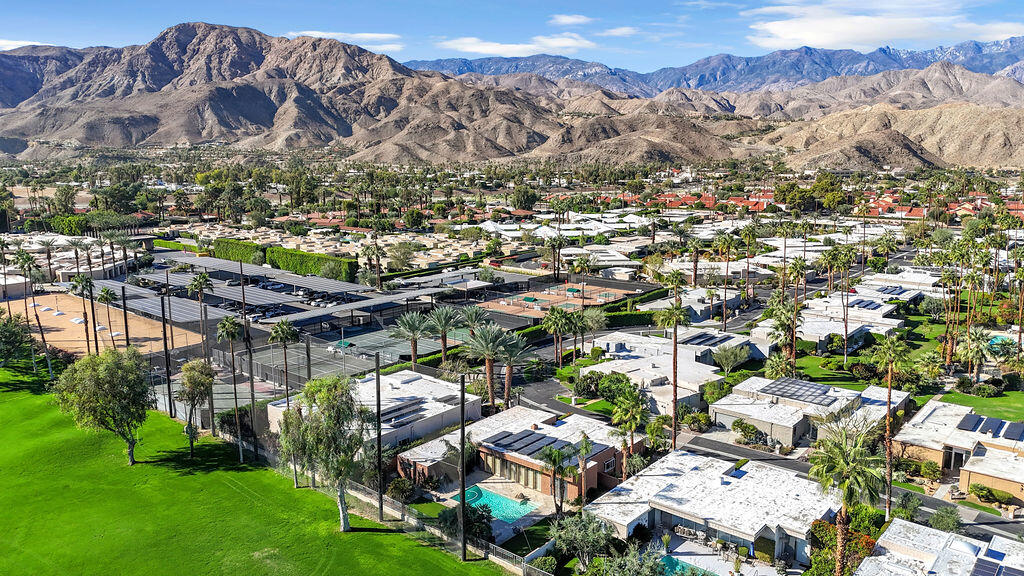 1421 Tamarisk W Street, Unit 3 Rancho Mirage, CA 92270 - Photo 57 of 65 an aerial view of residential house with an outdoor space