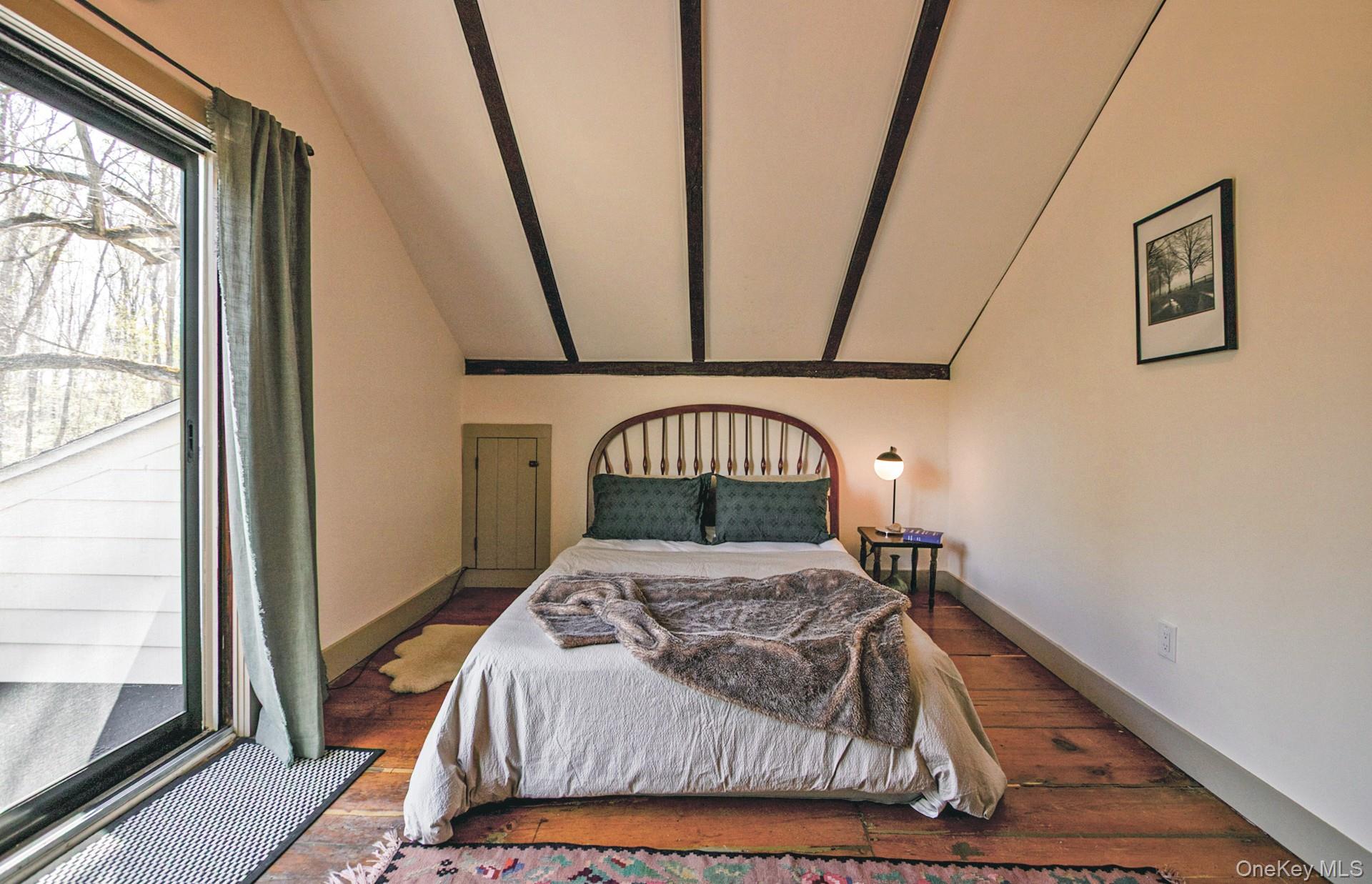 692 County Rte 2 Elizaville, NY 12523 - Photo 21 of 33 a bedroom with a bed and a large window