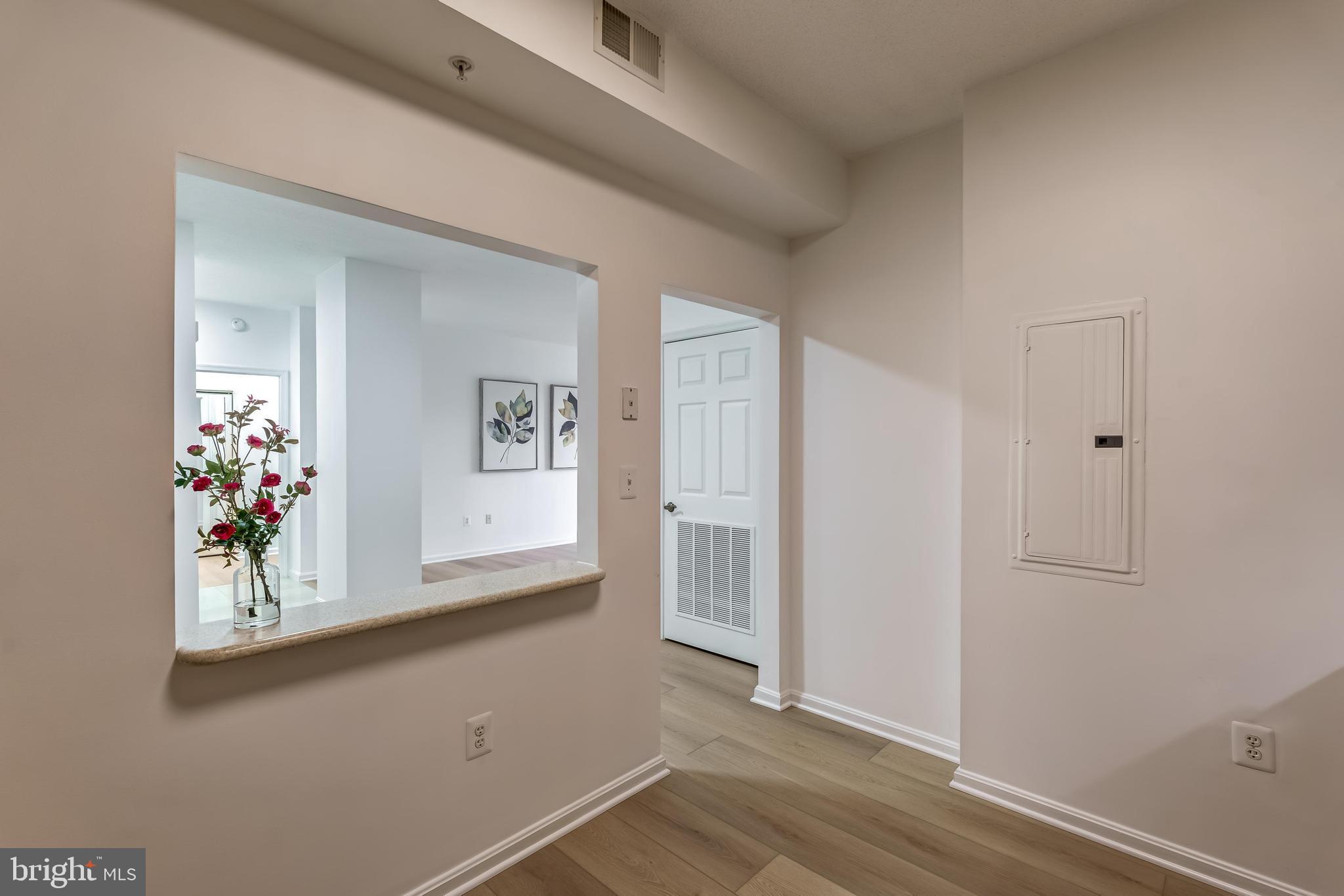 19355 Cypress Ridge Terrace, Unit 114 Leesburg, VA 20176 - Photo 13 of 42 a view of livingroom with wooden floor