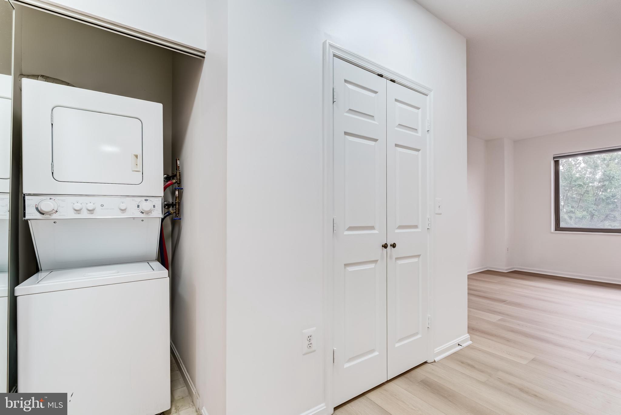 19355 Cypress Ridge Terrace, Unit 114 Leesburg, VA 20176 - Photo 25 of 42 a view of washer and dryer