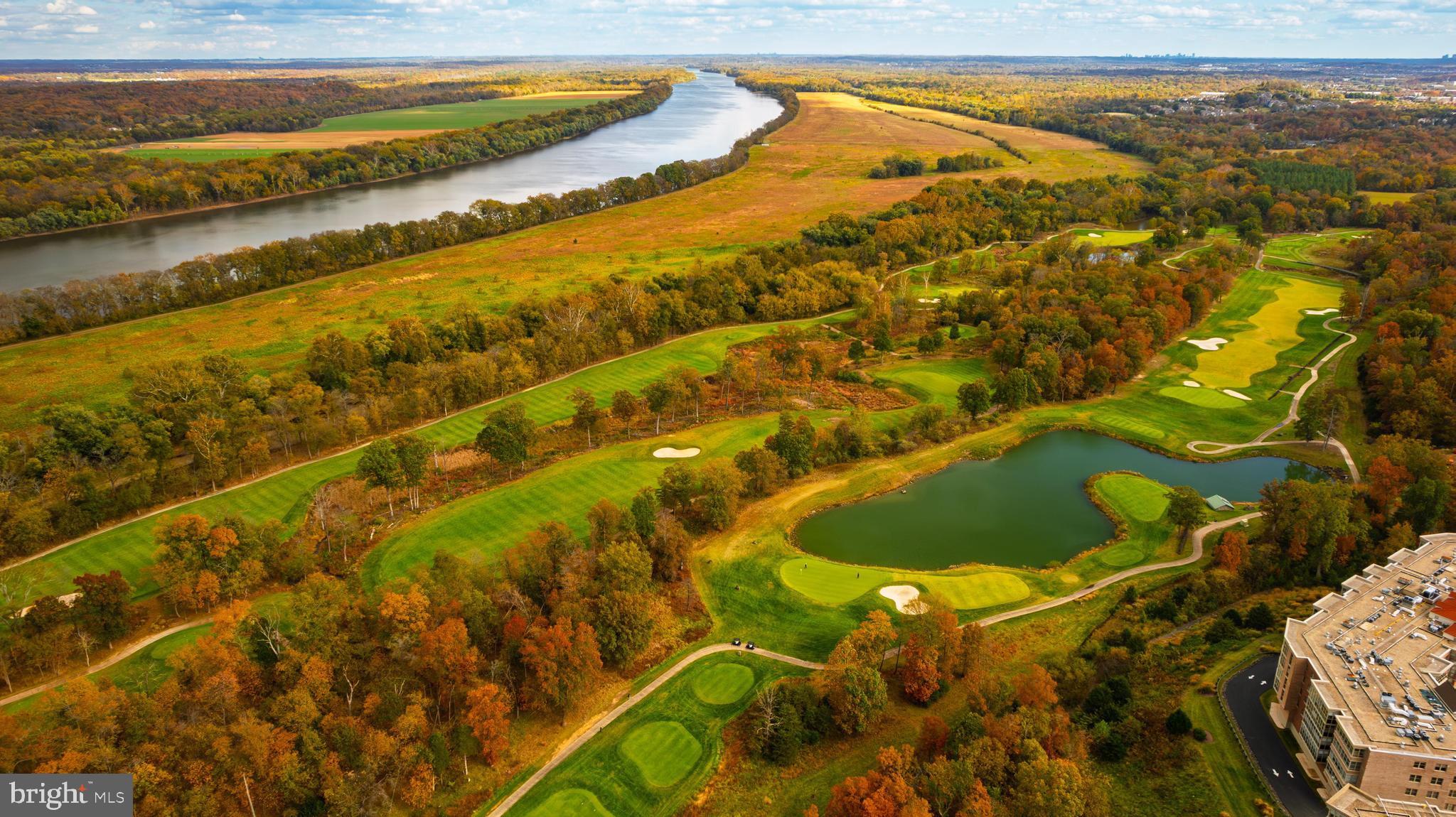 19355 Cypress Ridge Terrace, Unit 114 Leesburg, VA 20176 - Photo 34 of 42 a view of swimming pool from a lake
