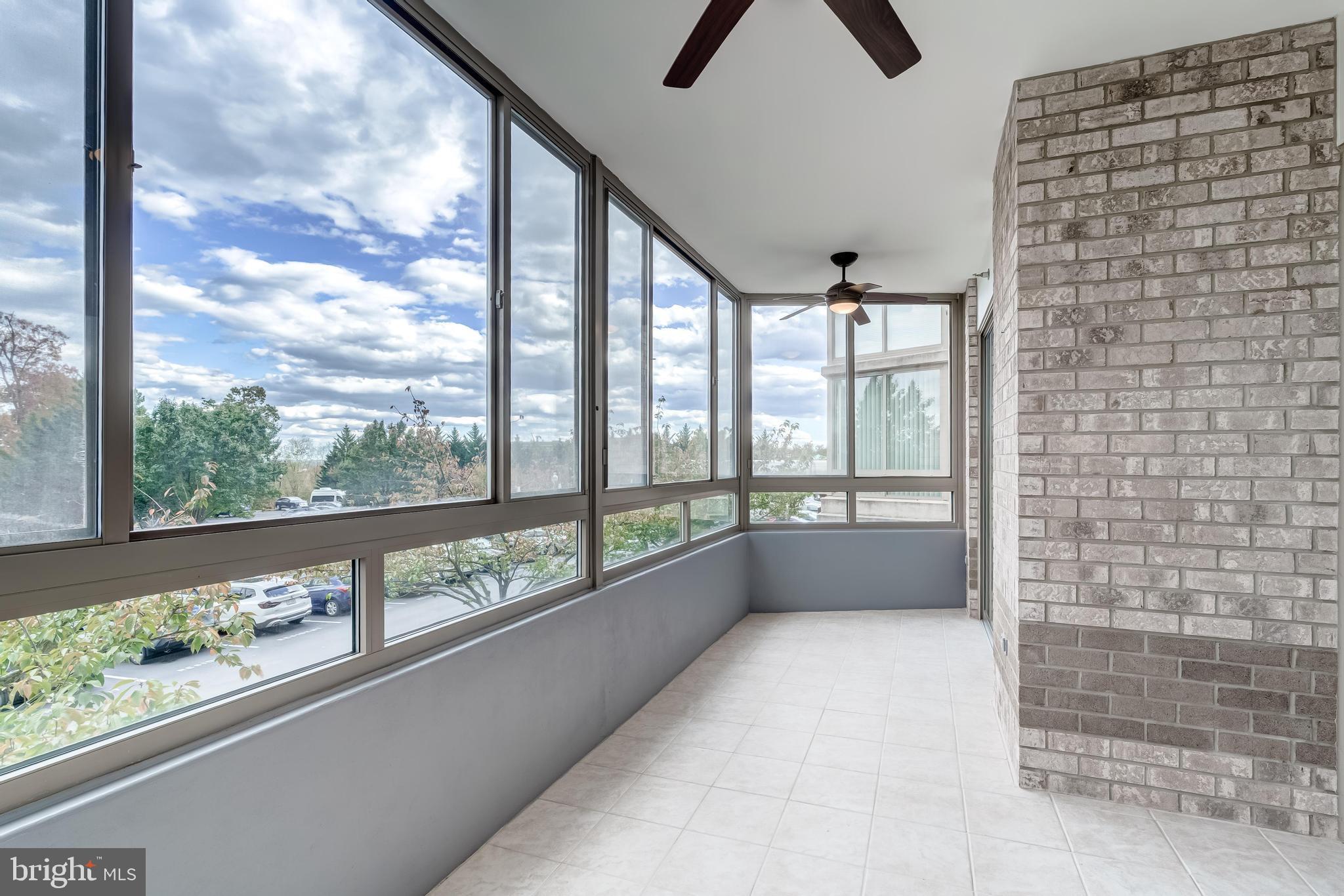 19355 Cypress Ridge Terrace, Unit 114 Leesburg, VA 20176 - Photo 6 of 42 a view of an entryway with a window