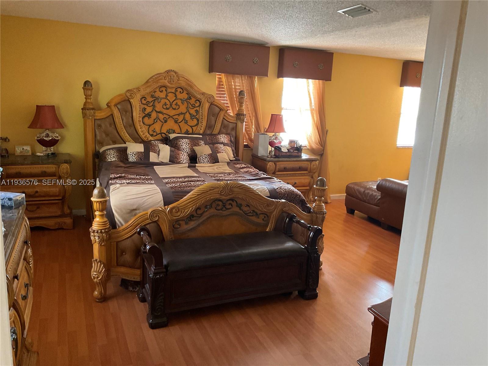 3161 Venice Way Miramar, FL 33025 - Photo 23 of 37 a bedroom with bed and a window