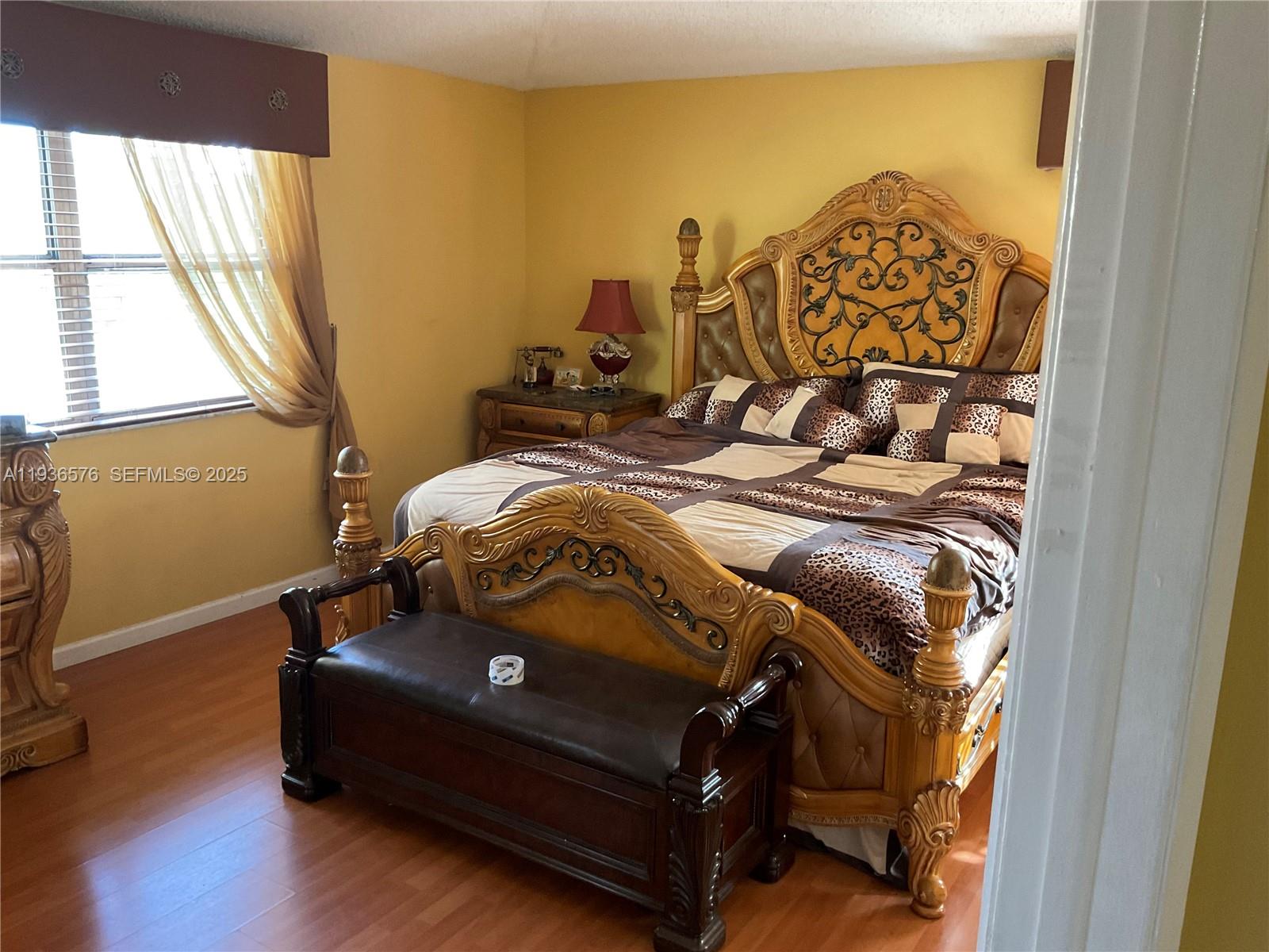 3161 Venice Way Miramar, FL 33025 - Photo 25 of 37 a bedroom with a bed and a window