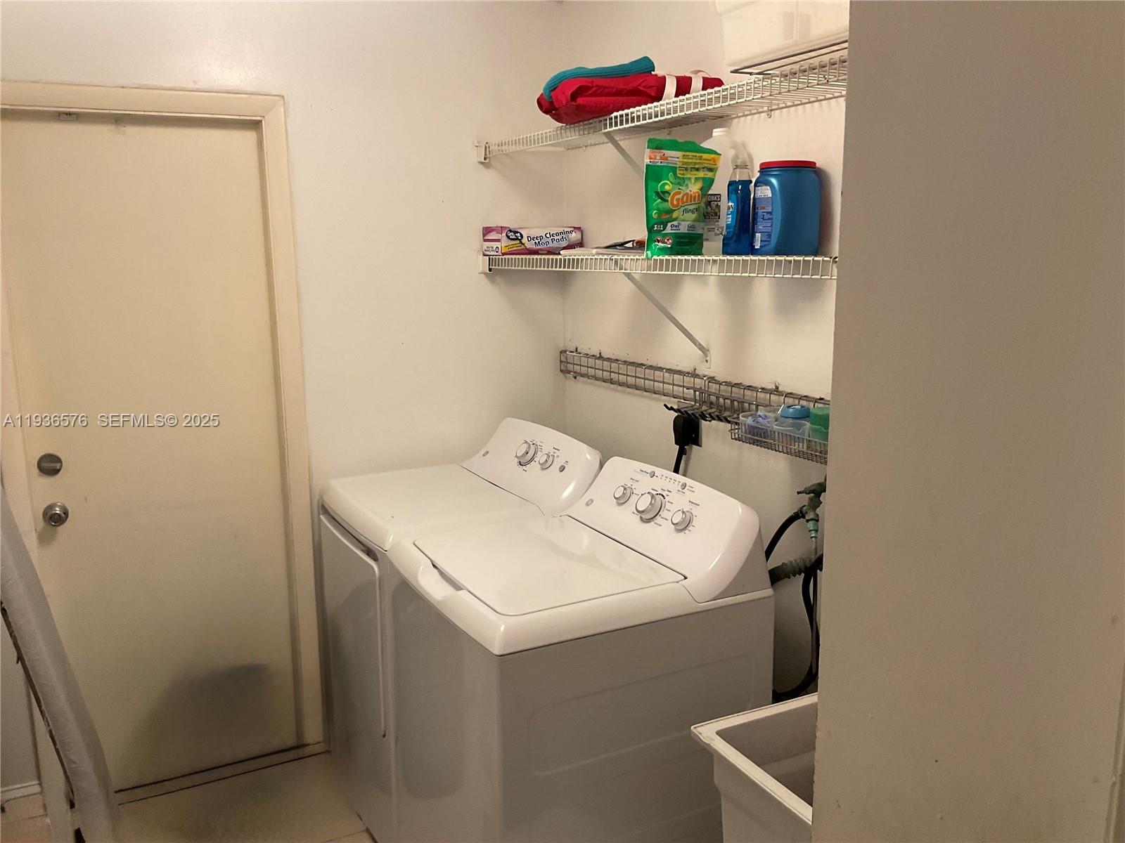 3161 Venice Way Miramar, FL 33025 - Photo 30 of 37 a utility room with dryer and washer