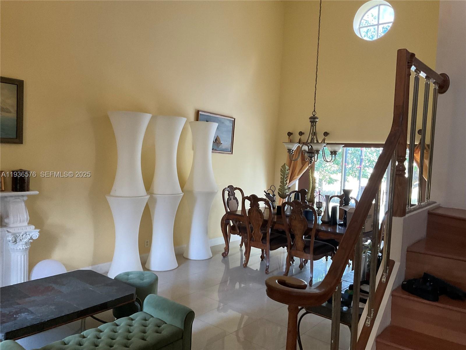 3161 Venice Way Miramar, FL 33025 - Photo 6 of 37 a living room with lots of furniture and wooden floor