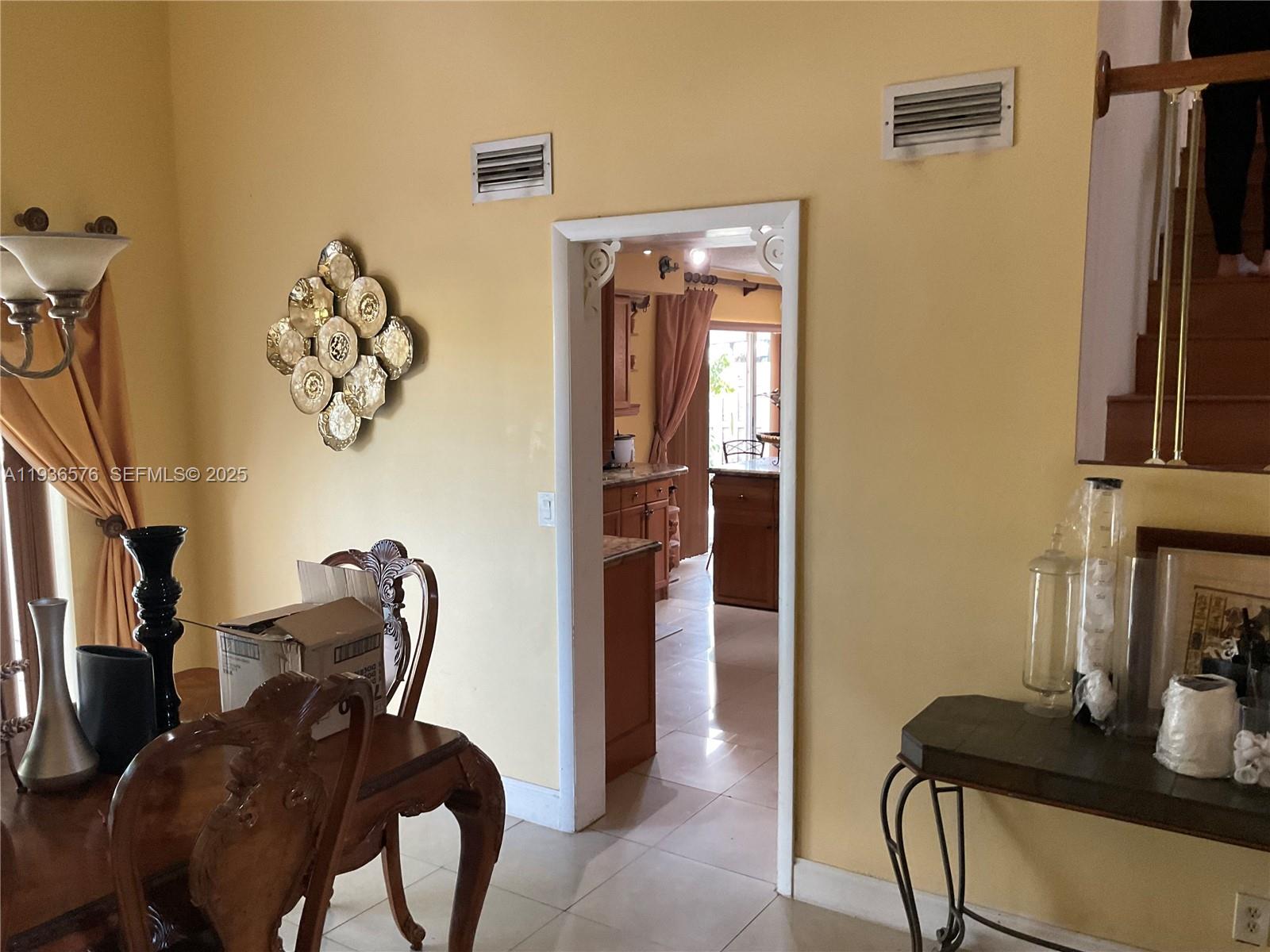 3161 Venice Way Miramar, FL 33025 - Photo 7 of 37 a view of a hallway with workspace