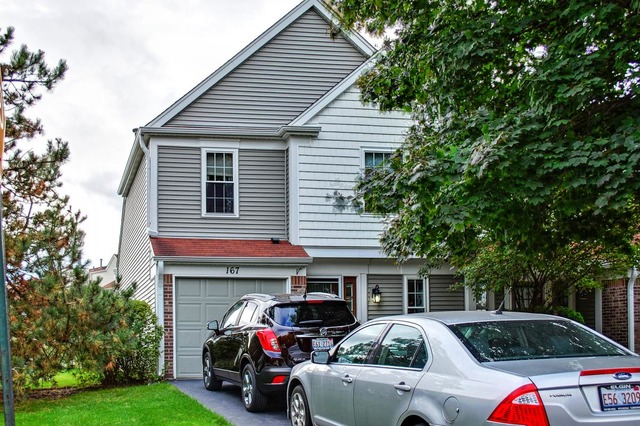 167 North Oltendorf Road Streamwood, IL 60107 - Photo 2 of 15 a view of a car parked in front of a house