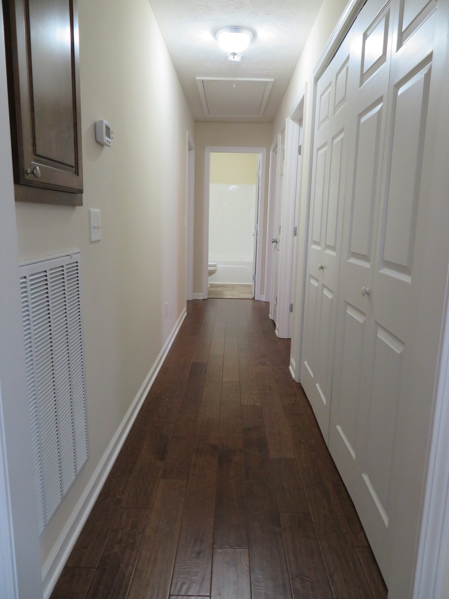 210 Shaub Road Portland, TN 37148 - Photo 11 of 22 a view of a hallway with wooden floor
