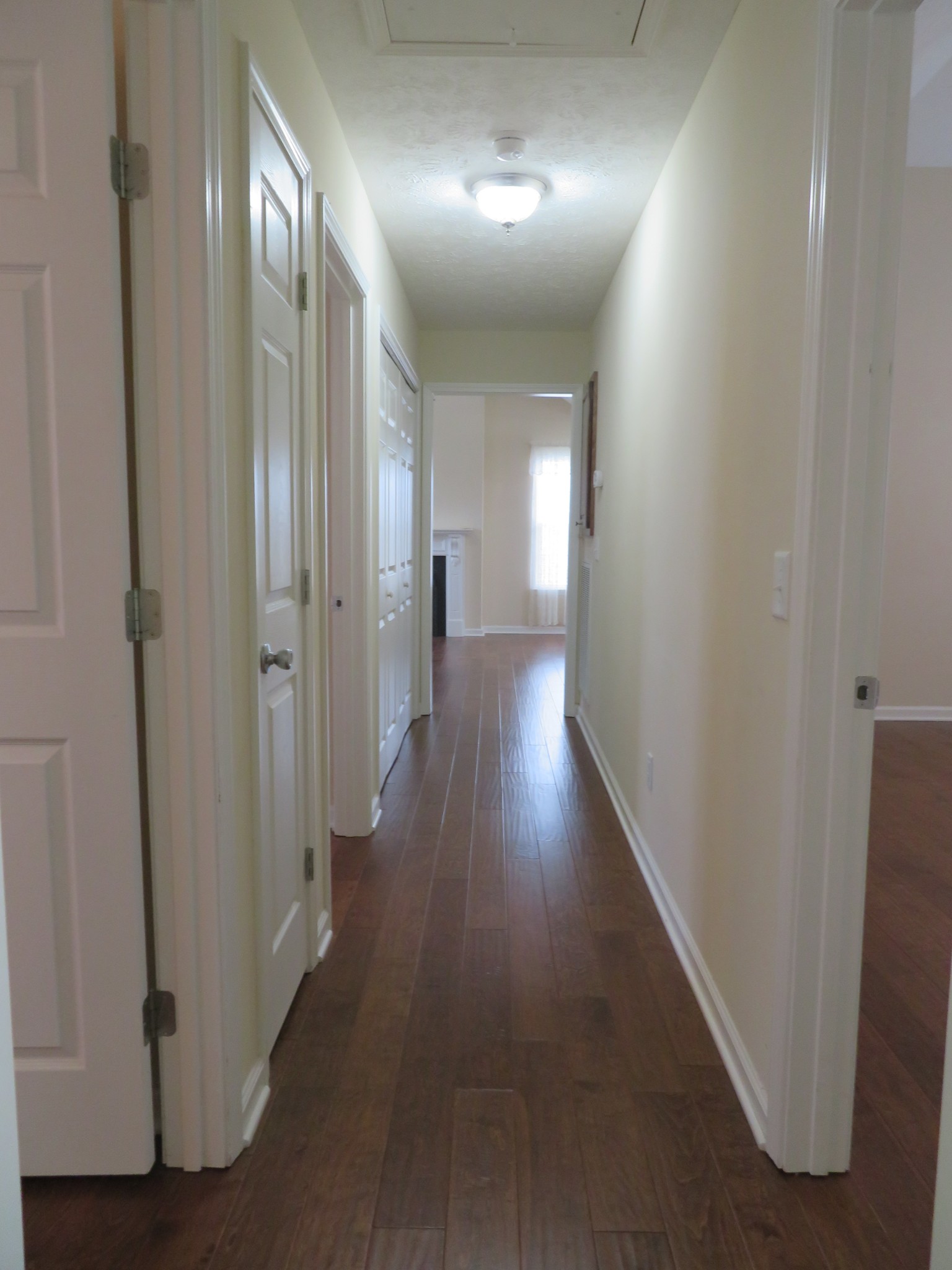 210 Shaub Road Portland, TN 37148 - Photo 18 of 22 a view of a hallway with wooden floor