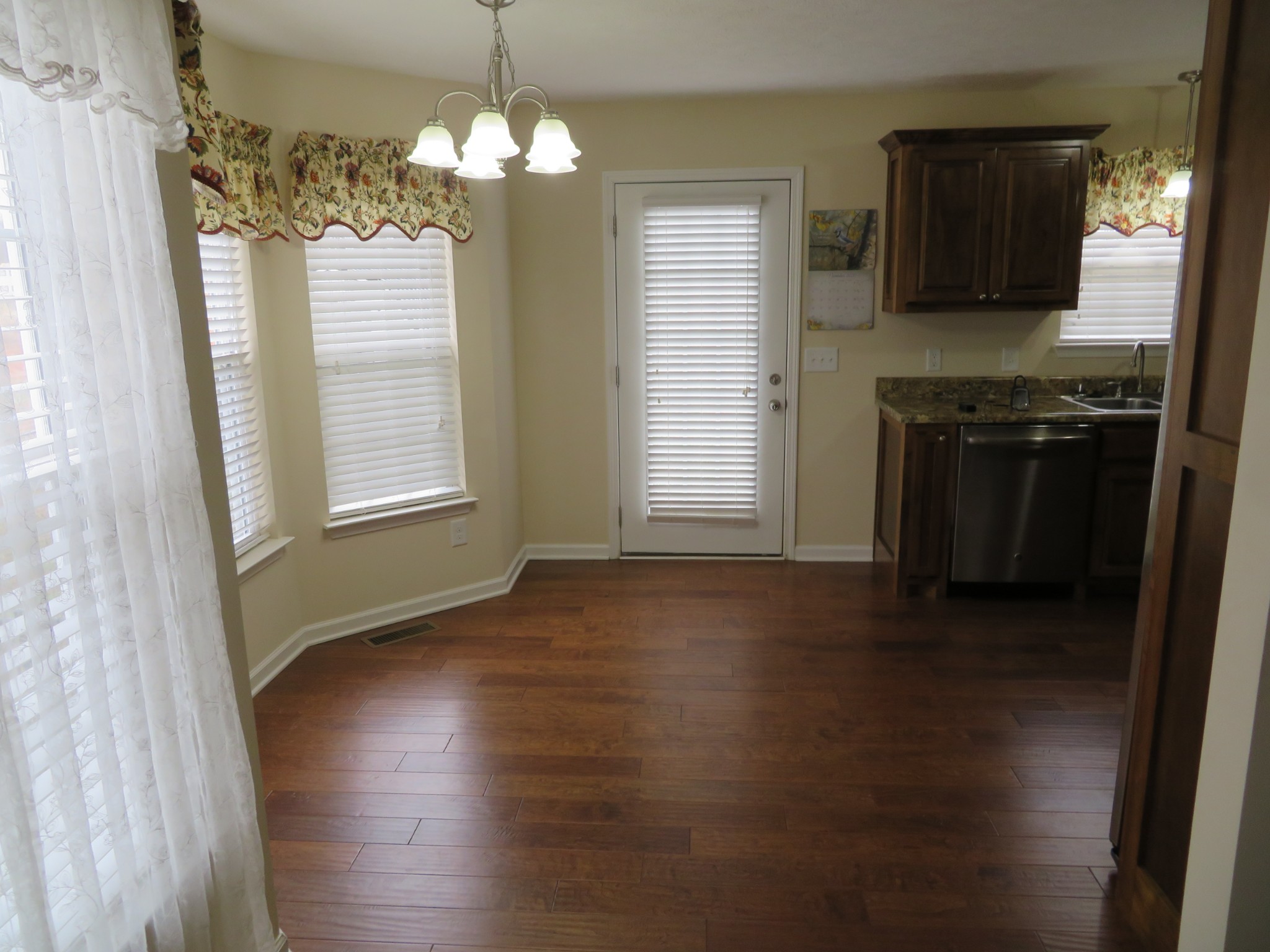 210 Shaub Road Portland, TN 37148 - Photo 7 of 22 a view of a kitchen with an empty space and a window