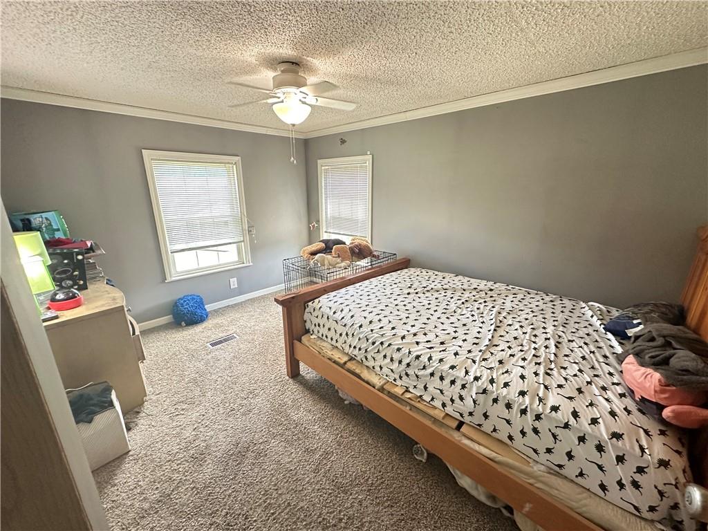 107 Rose Lane Rimersburg, PA 16248 - Photo 13 of 25 a bedroom with a bed and window