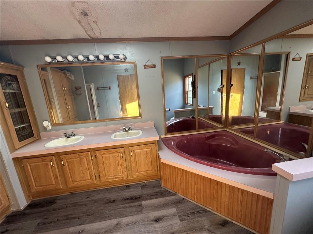 107 Rose Lane Rimersburg, PA 16248 - Photo 18 of 25 a spacious bathroom with a granite countertop sink and a large mirror