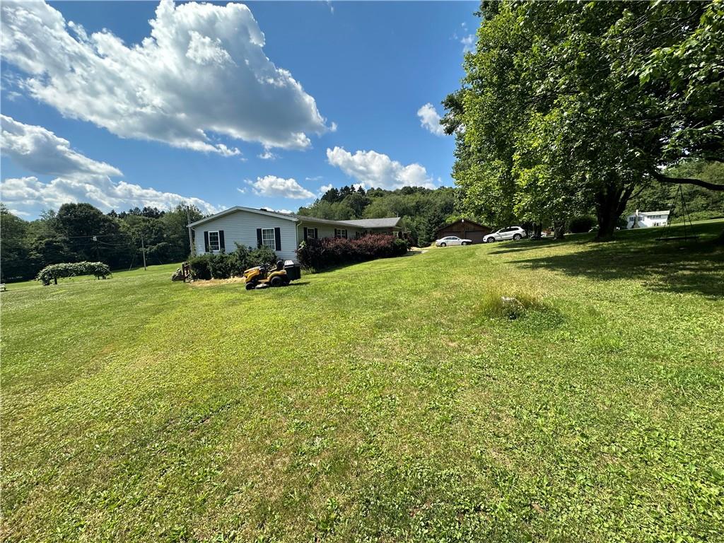 107 Rose Lane Rimersburg, PA 16248 - Photo 21 of 25 a view of a tree in front of a house