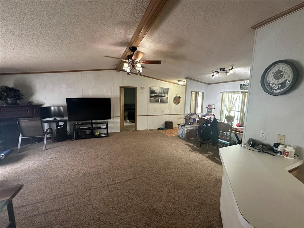 107 Rose Lane Rimersburg, PA 16248 - Photo 9 of 25 a living room with furniture and a flat screen tv