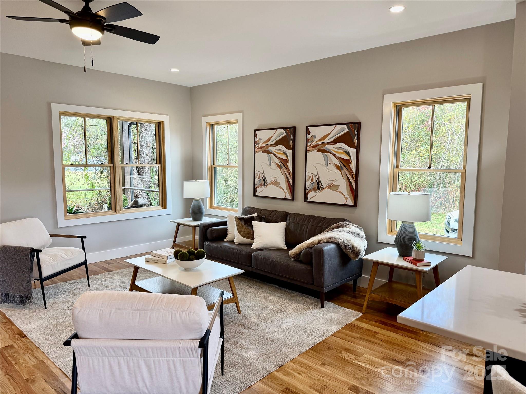296 Gallimore Road Brevard, NC 28712 - Photo 13 of 36 a living room with furniture and a window