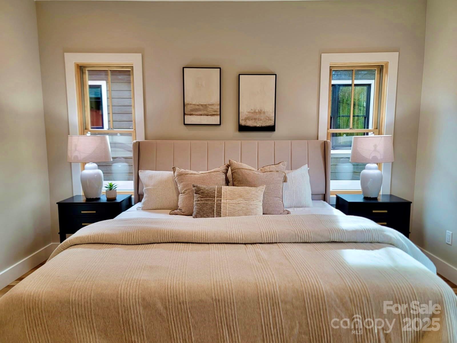 296 Gallimore Road Brevard, NC 28712 - Photo 17 of 36 a large white bed in a white room