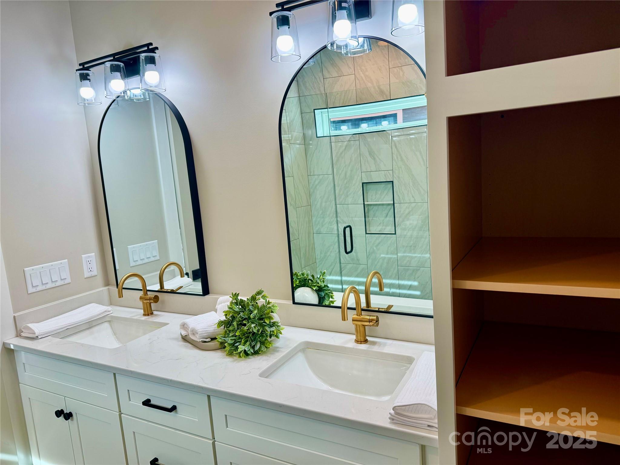 296 Gallimore Road Brevard, NC 28712 - Photo 20 of 36 a en suite bathroom with a sink and a mirror