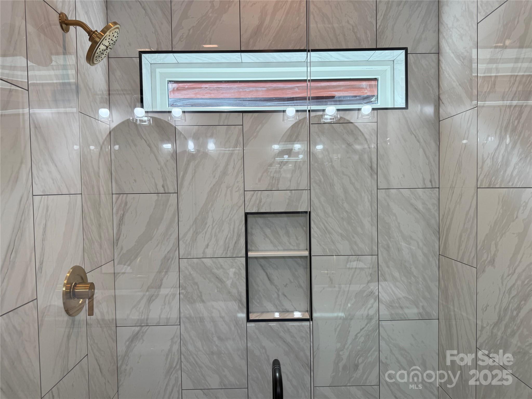 296 Gallimore Road Brevard, NC 28712 - Photo 21 of 36 a bathroom with a shower and vanity
