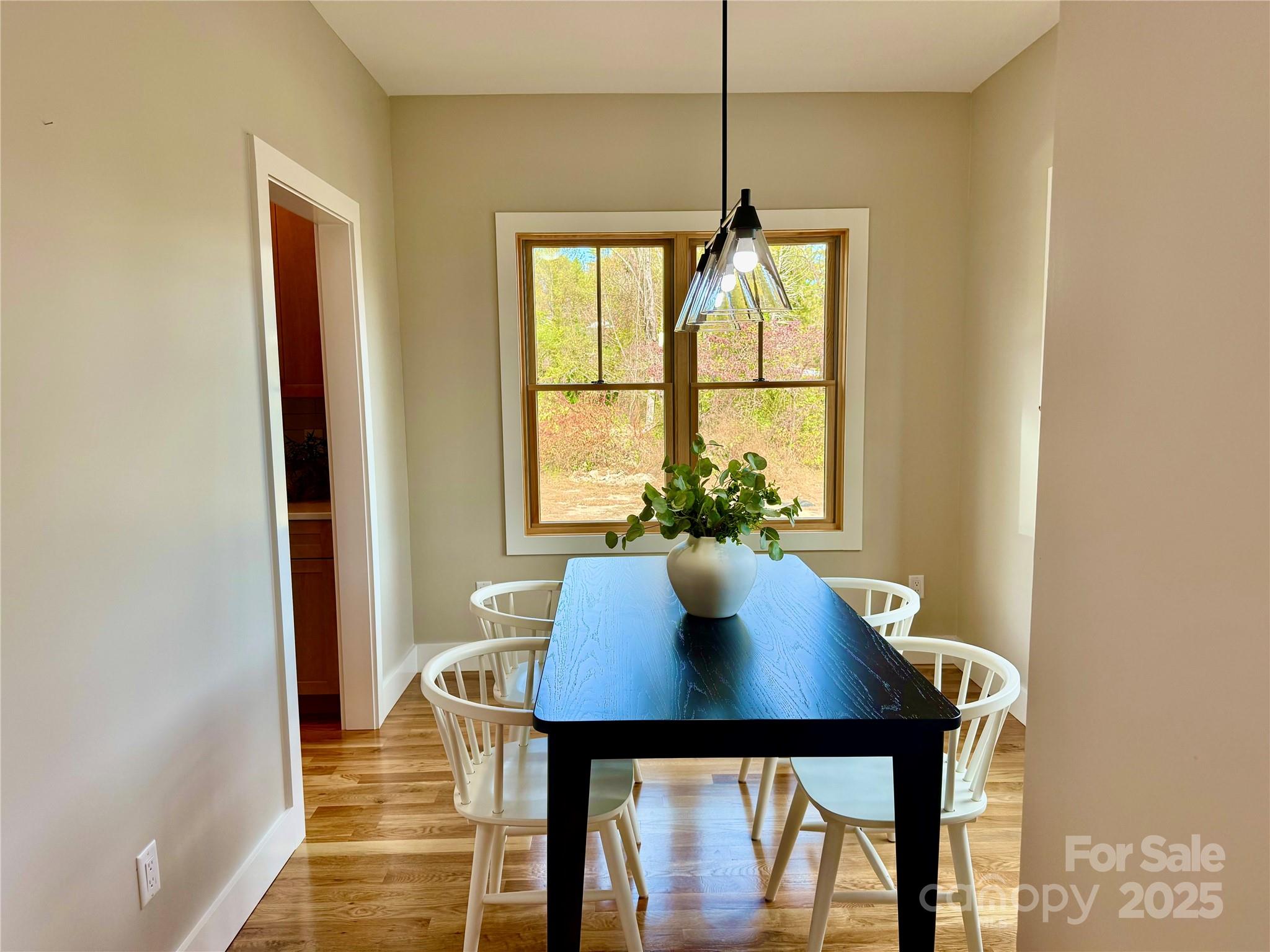 296 Gallimore Road Brevard, NC 28712 - Photo 3 of 36 a view of a dining room with furniture and window