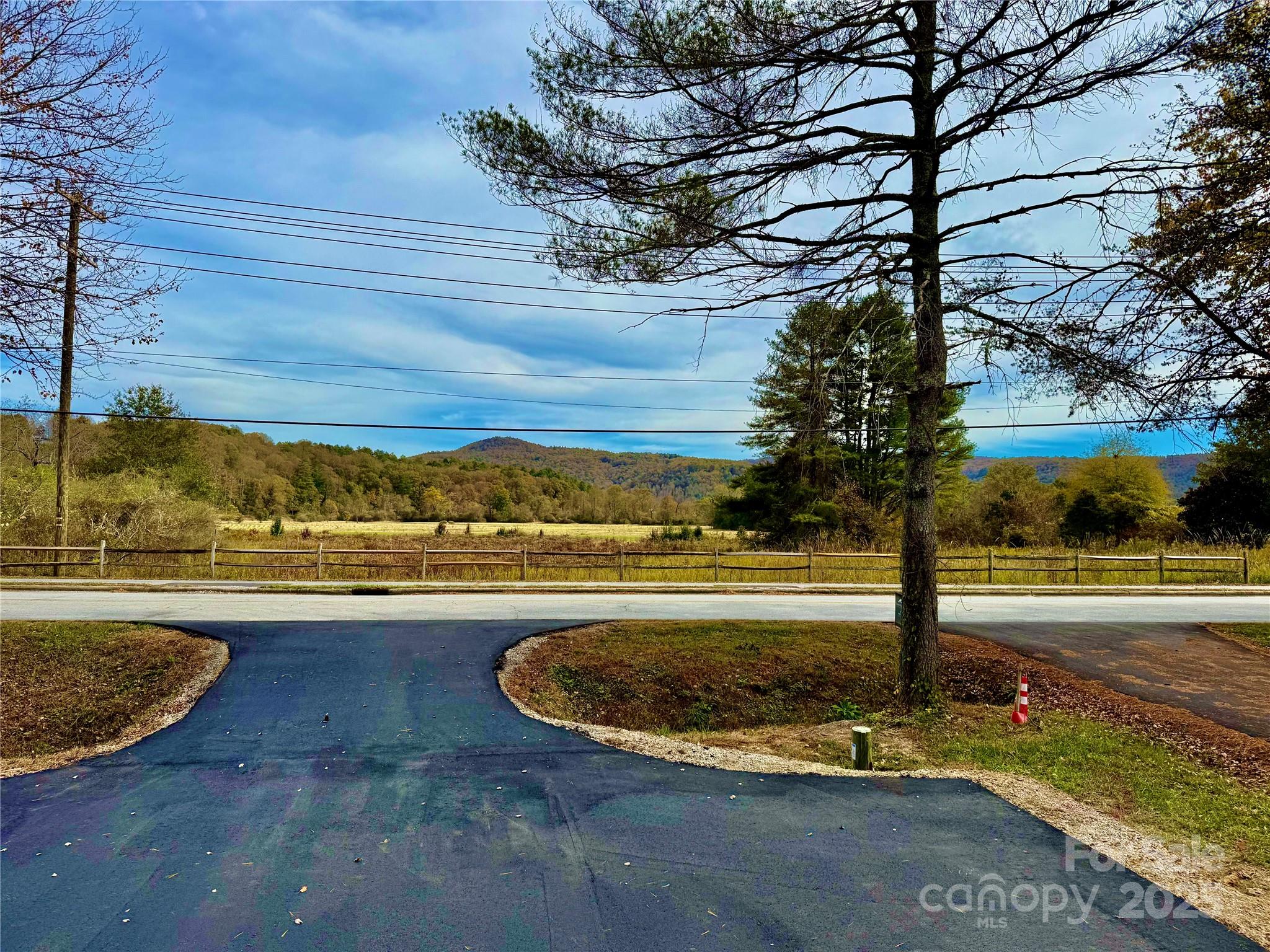 296 Gallimore Road Brevard, NC 28712 - Photo 34 of 36 a view of a swimming pool with an ocean view