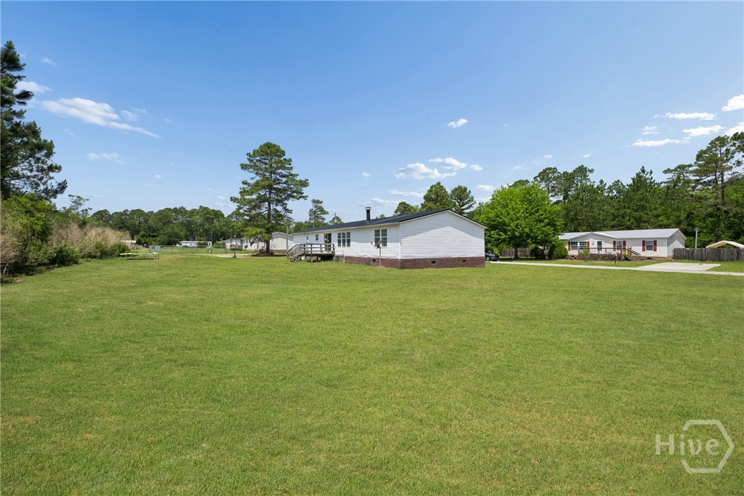 196 Tupelo Loop Ludowici, GA 31316 - Photo 29 of 34 **Grass Virtually enhanced