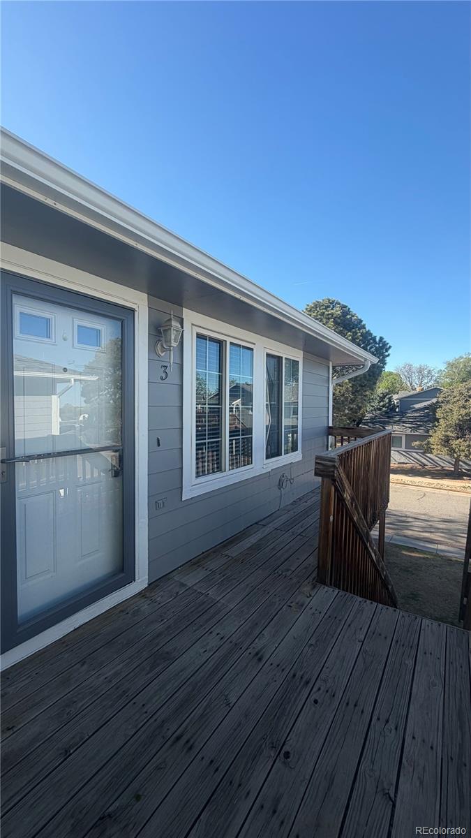 7907 York Street, Unit 3 Denver, CO 80229 - Photo 2 of 13 a view of deck with patio