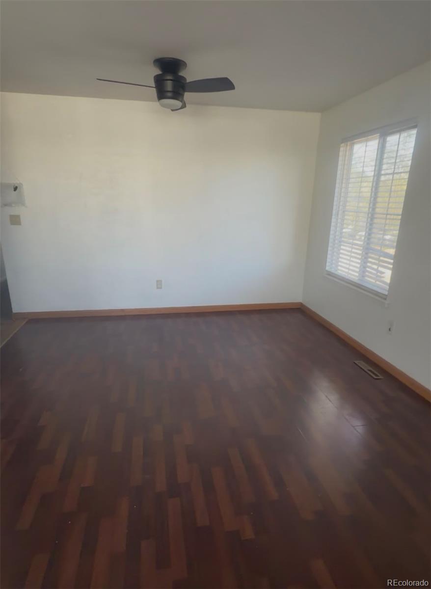 7907 York Street, Unit 3 Denver, CO 80229 - Photo 6 of 13 an empty room with a window