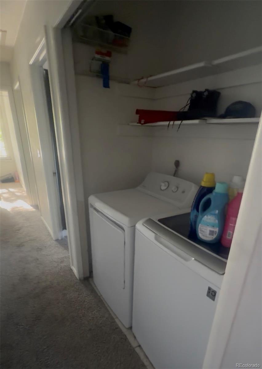 7907 York Street, Unit 3 Denver, CO 80229 - Photo 10 of 13 a utility room with dryer and washer