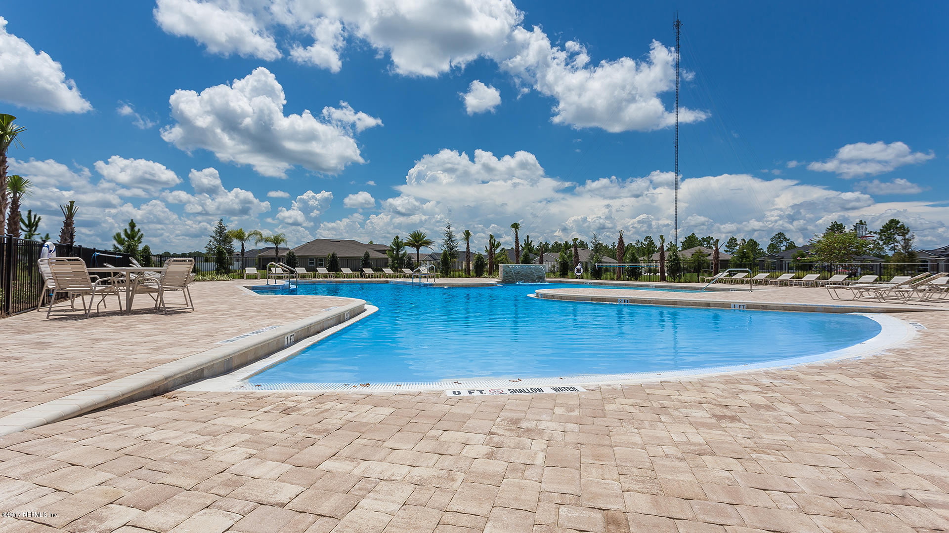 433 Deer Crossing Road St. Augustine, FL 32086 - Photo 5 of 23 a view of a swimming pool with sitting area