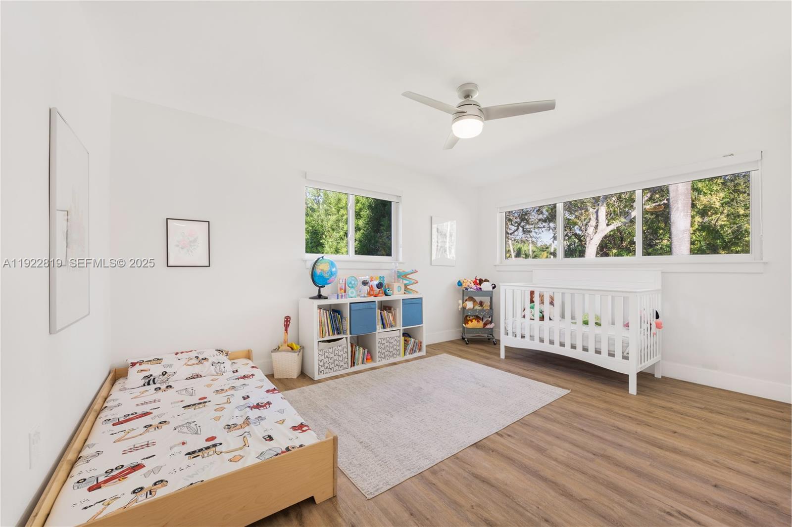 7880 Southwest 132nd Street Pinecrest, FL 33156 - Photo 13 of 22 a bedroom with furniture and a window