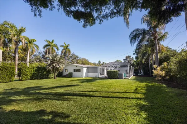 a view of a house with a big yard