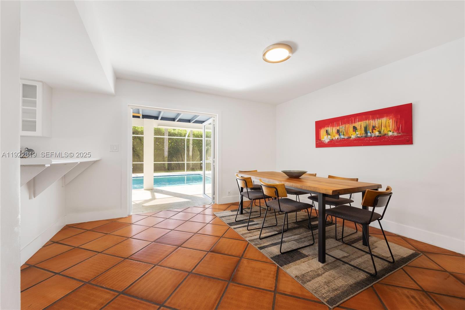 7880 Southwest 132nd Street Pinecrest, FL 33156 - Photo 8 of 22 a view of a room with furniture and a window