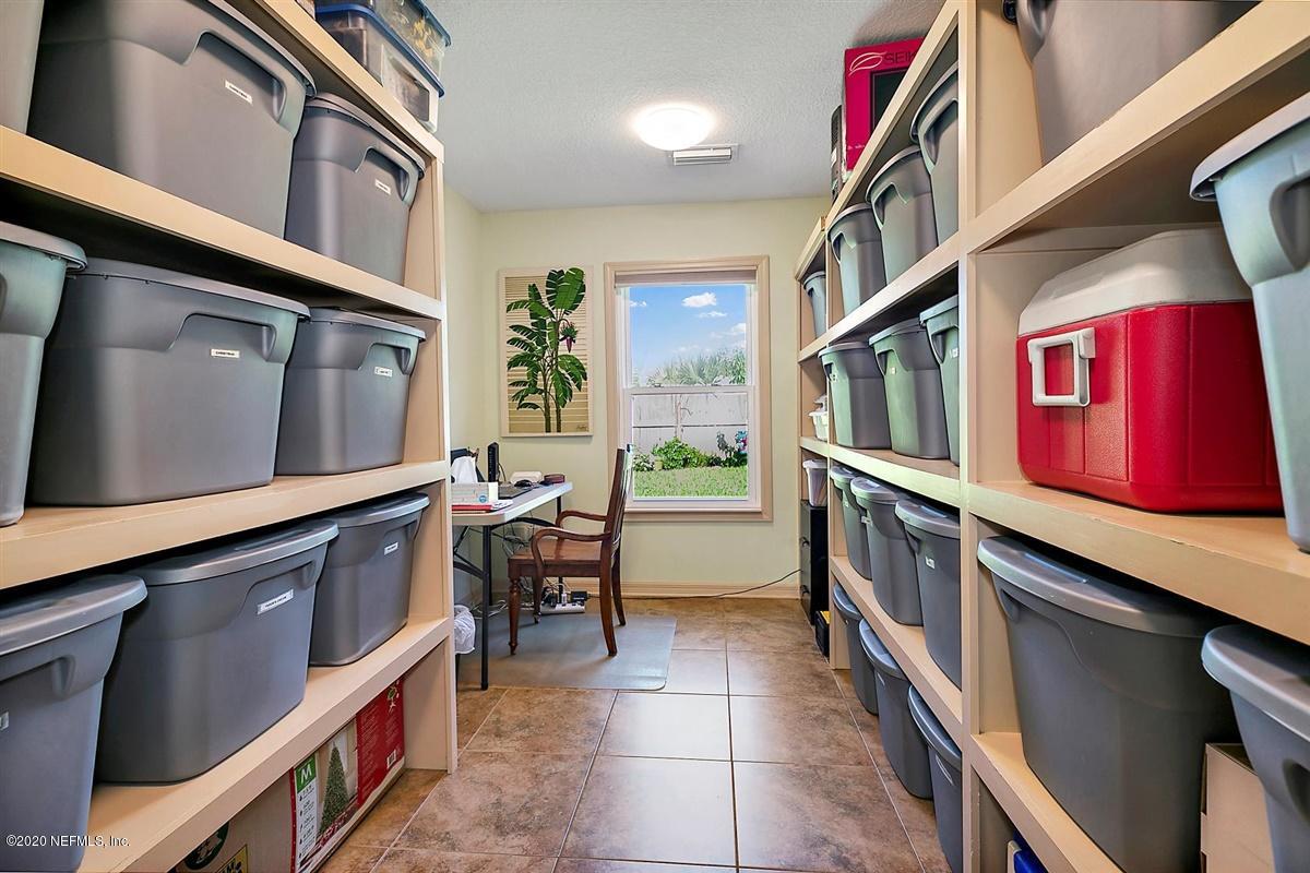1870 Seminole Road Atlantic Beach, FL 32233 - Photo 20 of 27 a hall with furniture and a window